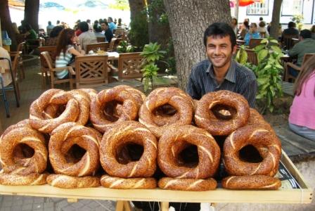 Smiling Street Vendor selling Smit